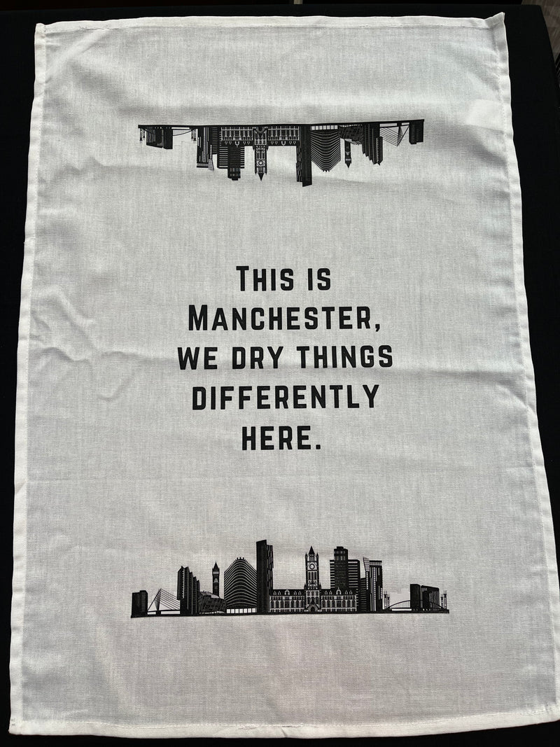 This is Manchester Tea Towel by One of a Kind